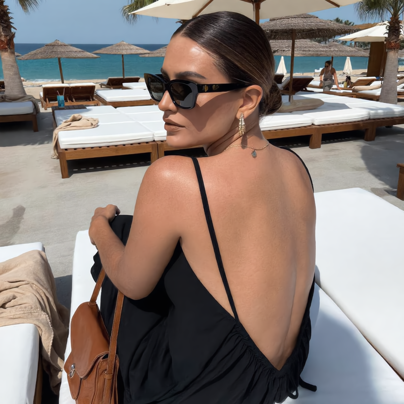Customer wearing the backless dress at home